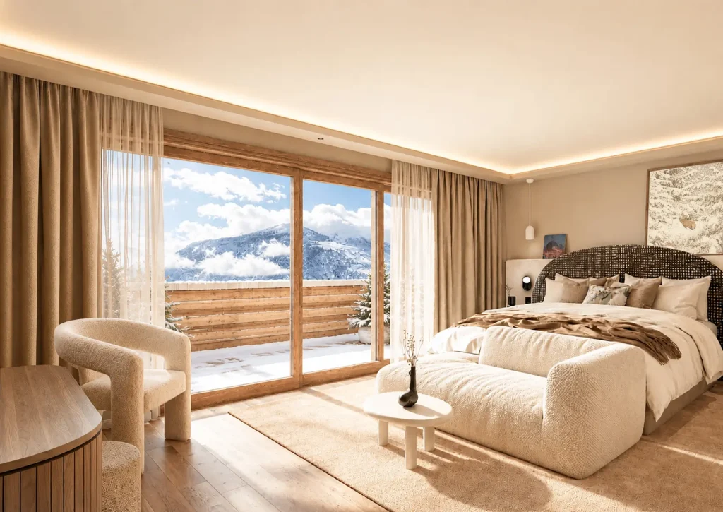 Junior Suite du Bârma Courchevel Hôtel 4 étoiles avec banquette et terrasse vue montagne