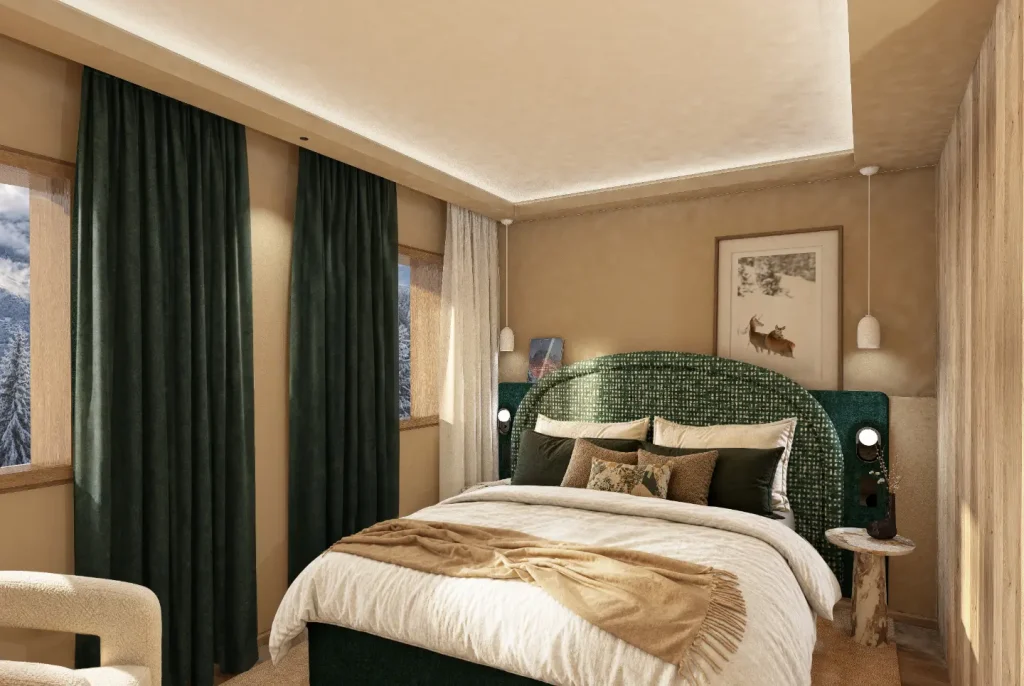 Chambre du Bârma Courchevel 1400 Hôtel & Spa avec tête de lit arrondie verte et vue sur les montagnes
